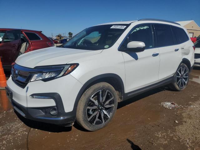 HONDA PILOT ELIT 2022 with VIN 5FNYF6H04NB066147 - Photo from auction