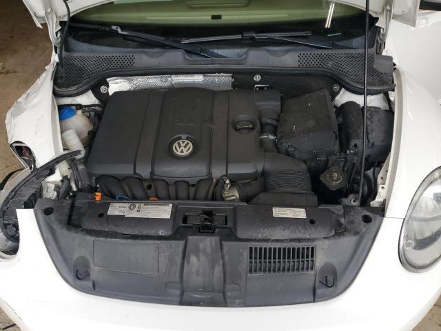 Photo 11 from auction – 2013 VOLKSWAGEN BEETLE with VIN 3VWJP7AT3DM632041