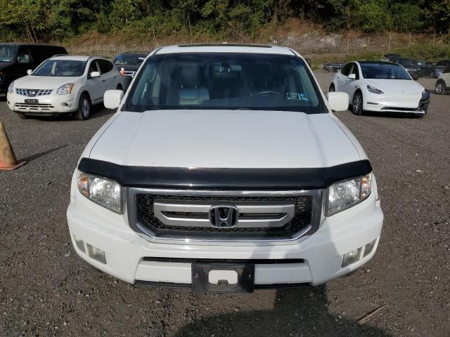 Photo 5 from auction – 2010 HONDA RIDGELINE with VIN 5FPYK1F57AB009276
