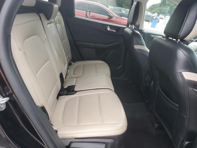 Photo 11 from auction – 2021 FORD ESCAPE TITANIUM with VIN 1FMCU9J97MUA71094