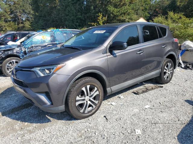 Photo 1 from auction – 2018 TOYOTA RAV4 LE with VIN 2T3ZFREV9JW426880
