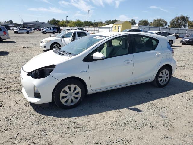 TOYOTA PRIUS C 2014 with VIN JTDKDTB33E1077694 - Photo from auction