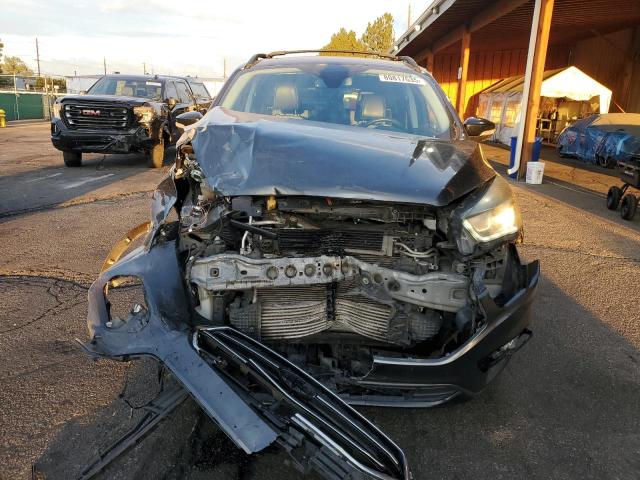 Photo 5 from auction – 2017 FORD ESCAPE TITANIUM with VIN 1FMCU9J90HUA38959