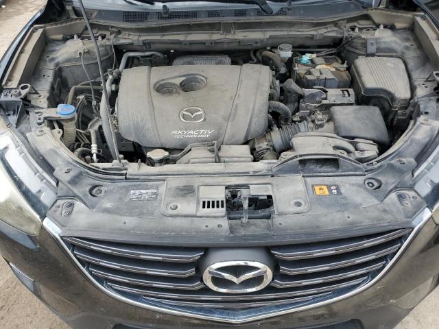 Photo 12 from auction – 2016 MAZDA CX-5 SPORT with VIN JM3KE2BY0G0647167