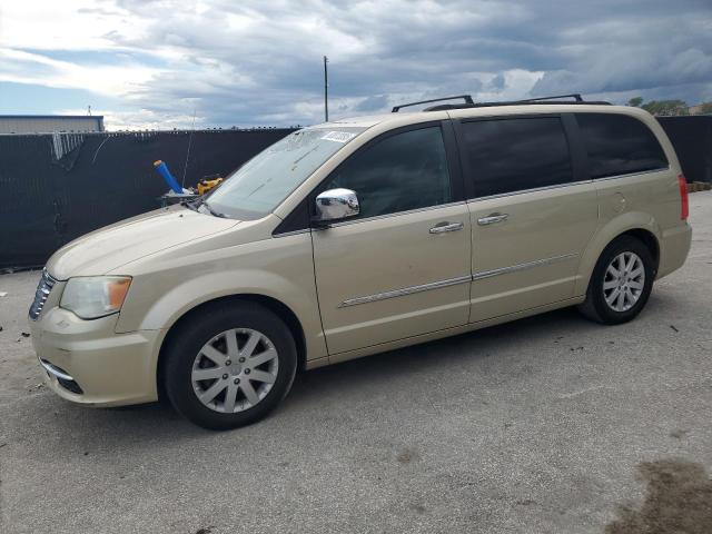 CHRYSLER TOWN & COU 2011 con VIN 2A4RR8DG1BR676785 - Foto de la subasta