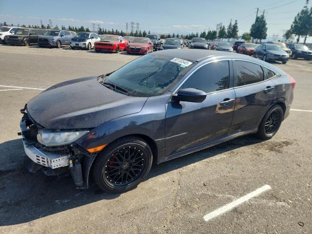 HONDA CIVIC LX 2018 with VIN 2HGFC2F53JH520059 - Photo from auction