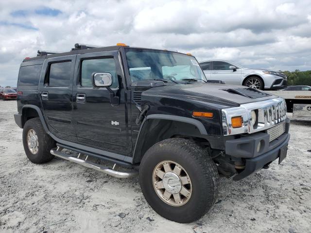 Photo 4 from auction – 2003 HUMMER H2 with VIN 5GRGN23U33H132491