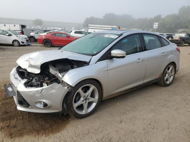 FORD FOCUS TITANIUM 2012 with VIN 1FAHP3J22CL174077 - Photo from auction