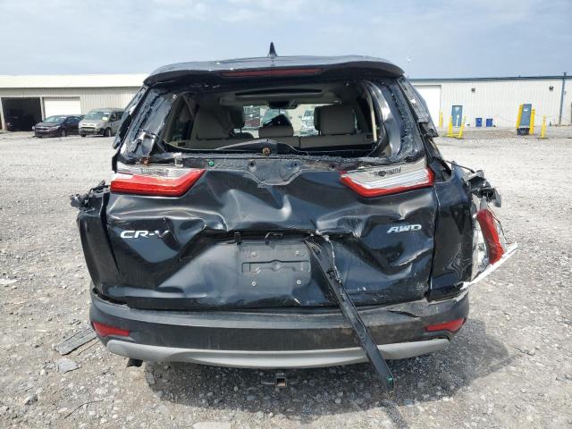 Photo 6 from auction – 2018 HONDA CR-V with VIN 7FARW2H87JE082523