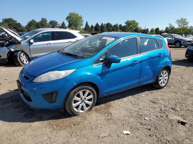 FORD FIESTA SE 2012 with VIN 3FADP4EJ9CM102104 - Photo from auction