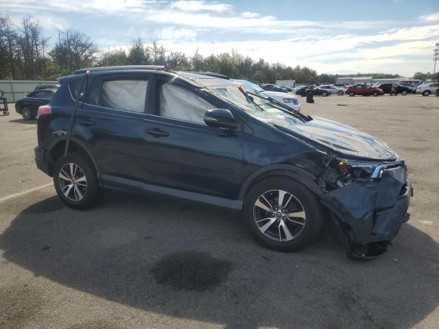 Photo 4 from auction – 2017 TOYOTA RAV4 XLE with VIN JTMRFREV5HD210578