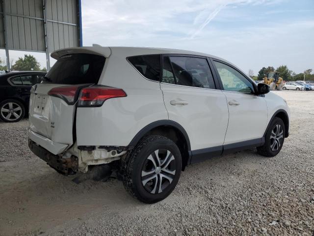 Photo 3 from auction – 2018 TOYOTA RAV4 LE with VIN JTMBFREV6JD250756
