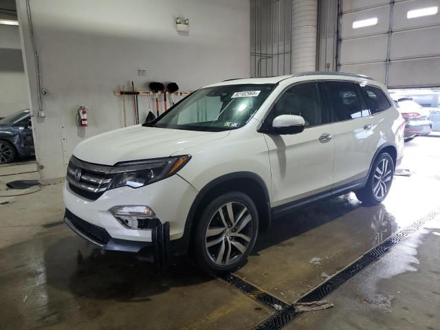 HONDA PILOT TOUR 2017 with VIN 5FNYF6H90HB078251 - Photo from auction