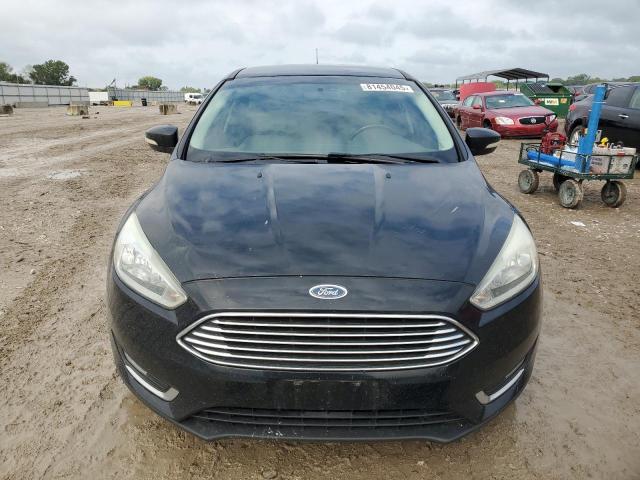 Photo 5 from auction – 2016 FORD FOCUS TITANIUM with VIN 1FADP3N27GL332640