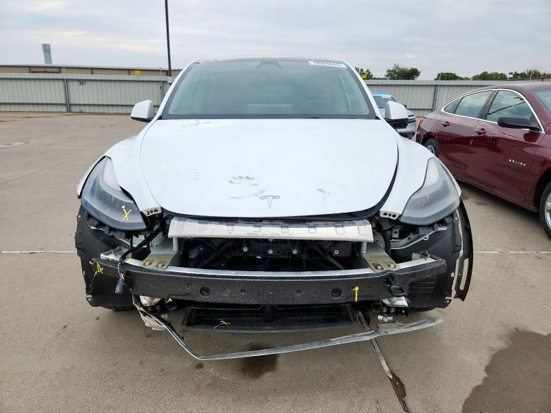 Photo 5 from auction – 2023 TESLA MODEL Y with VIN 7SAYGAEE9PF625147