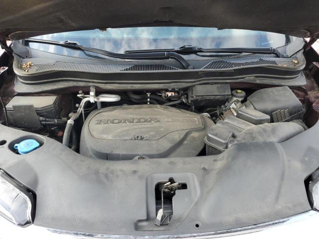 Photo 12 from auction – 2021 HONDA PILOT TOURING with VIN 5FNYF6H94MB041116