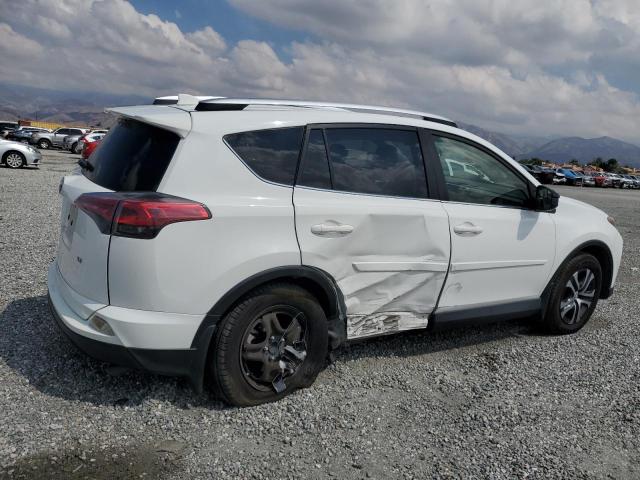 Photo 3 from auction – 2016 TOYOTA RAV4 LE with VIN JTMZFREV4GJ098663