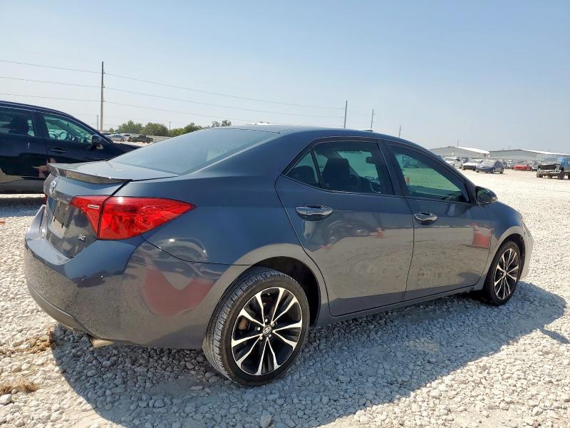 Photo 3 from auction – 2017 TOYOTA COROLLA L with VIN 5YFBURHE0HP601623