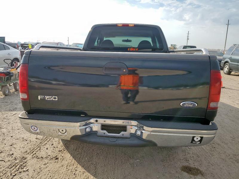 Photo 6 from auction – 1999 FORD F150 with VIN 1FTRX17W3XNB91574