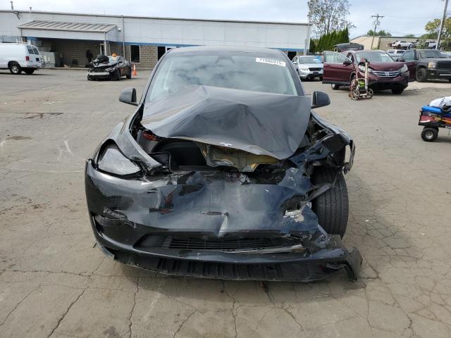 Photo 5 from auction – 2023 TESLA MODEL Y with VIN 7SAYGAEE6PF860007