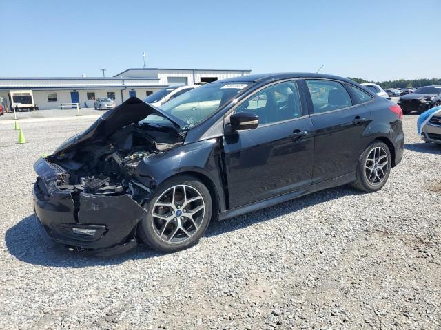 FORD FOCUS SE 2016 with VIN 1FADP3F24GL402934 - Photo from auction