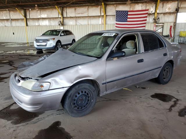 TOYOTA COROLLA VE 2000 with VIN 1NXBR12E1YZ402431 - Photo from auction
