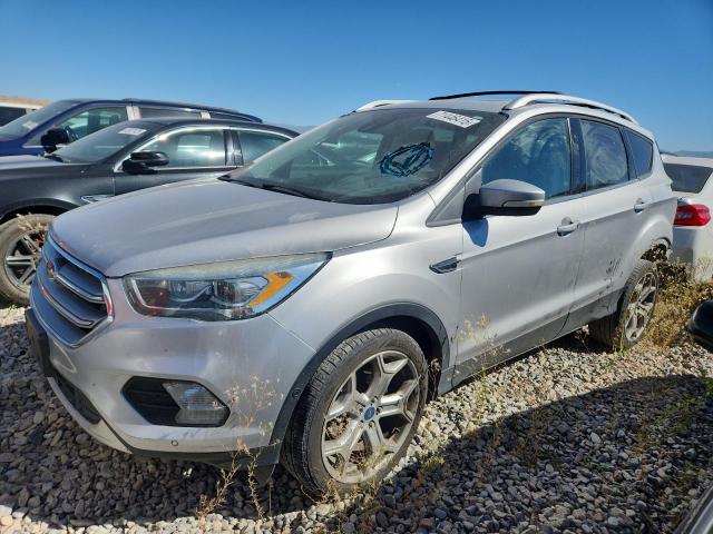 FORD ESCAPE TITANIUM 2017 with VIN 1FMCU9J93HUB26713 - Photo from auction