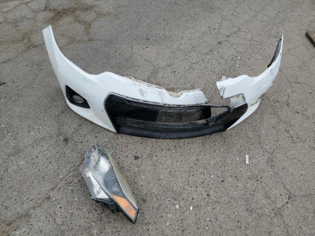 Photo 12 from auction – 2014 TOYOTA COROLLA L with VIN 5YFBURHE5EP102649