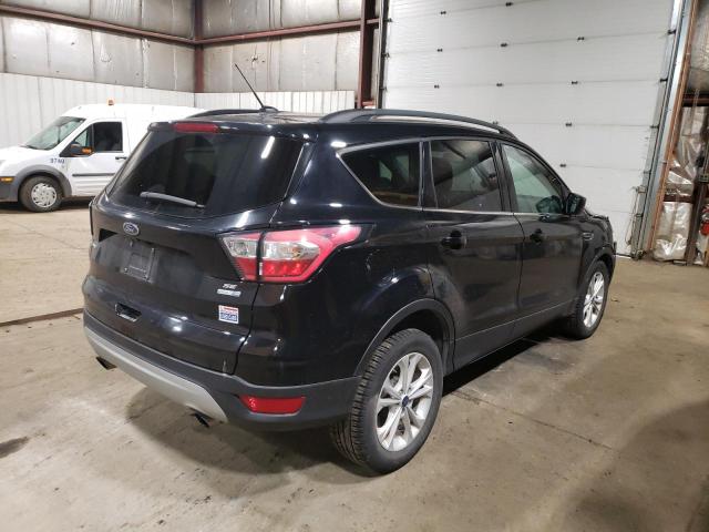 Photo 3 from auction – 2018 FORD ESCAPE SE with VIN 1FMCU9GD6JUB15559