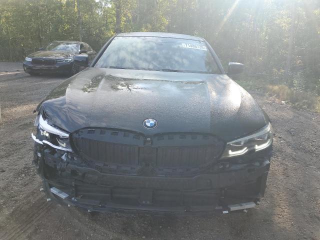 Photo 5 from auction – 2021 BMW 330XI with VIN 3MW5R7J03M8B89240