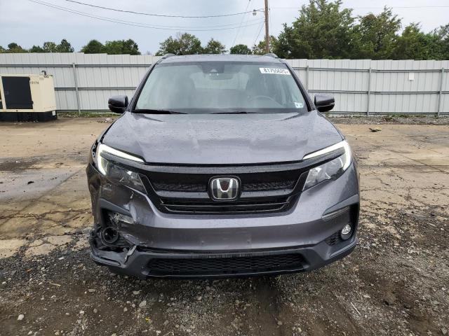 Photo 5 from auction – 2022 HONDA PILOT SE with VIN 5FNYF6H26NB063459