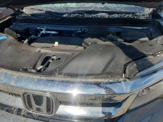 Photo 12 from auction – 2022 HONDA PILOT TOUR with VIN 5FNYF6H68NB077916