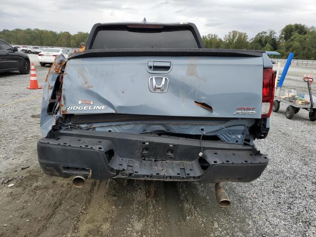 Photo 6 from auction – 2023 HONDA RIDGELINE with VIN 5FPYK3F15PB050958