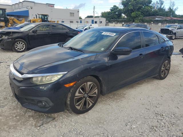HONDA CIVIC EXL 2016 with VIN 19XFC1F76GE215833 - Photo from auction