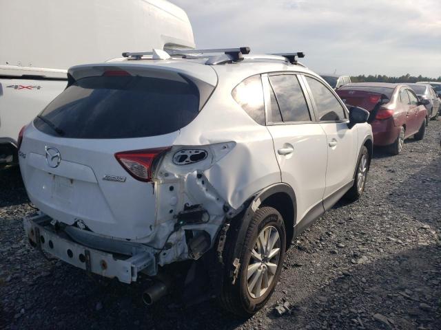 Photo 3 from auction – 2014 MAZDA CX-5 TOURI with VIN JM3KE2CY7E0318283