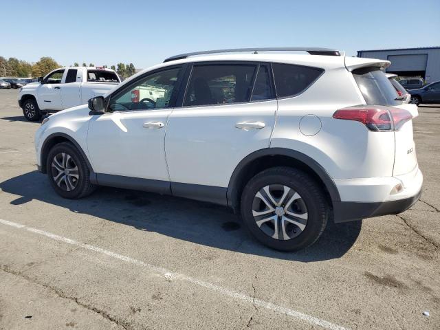 Photo 2 from auction – 2017 TOYOTA RAV4 LE with VIN JTMBFREV2HJ714430