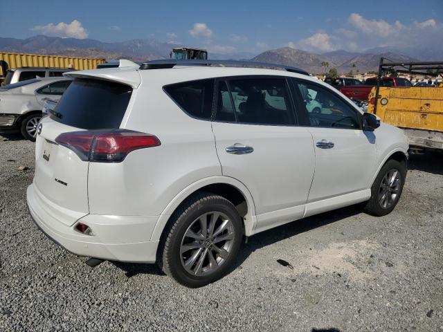 Photo 3 from auction – 2017 TOYOTA RAV4 LIMITED with VIN 2T3YFREV6HW314771