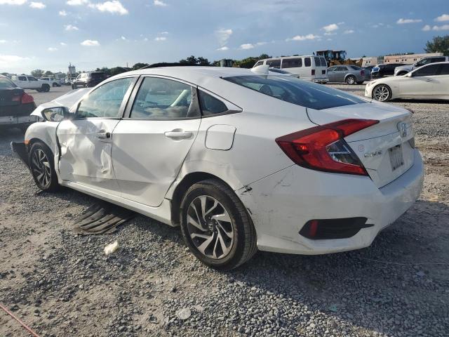 Photo 2 from auction – 2018 HONDA CIVIC EX with VIN 19XFC2F72JE002861