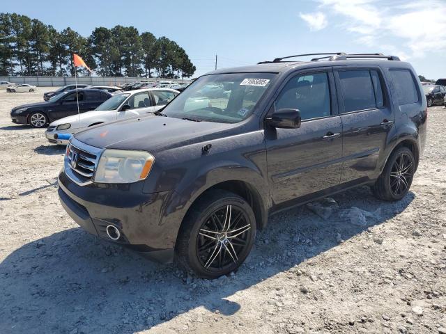 HONDA PILOT EXL 2012 with VIN 5FNYF3H5XCB043074 - Photo from auction