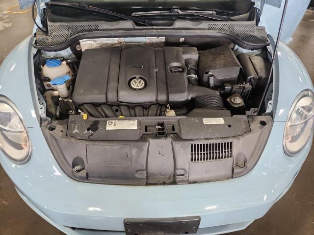 Photo 11 from auction – 2014 VOLKSWAGEN BEETLE with VIN 3VWJX7AT7EM629886