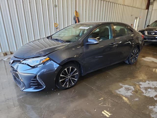TOYOTA COROLLA L 2017 with VIN 2T1BURHE5HC830296 - Photo from auction