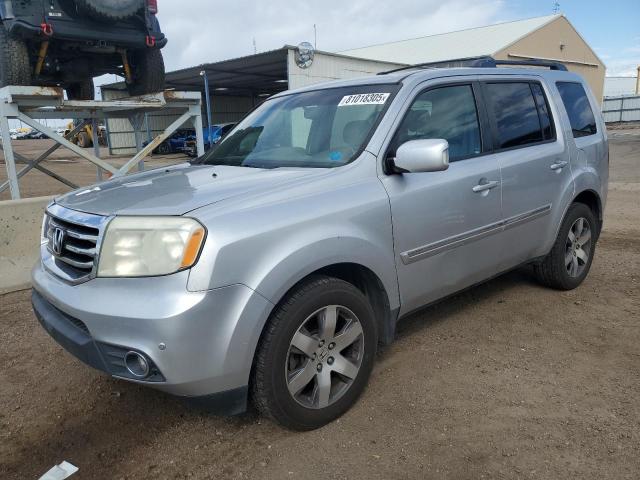 HONDA PILOT TOUR 2013 with VIN 5FNYF4H94DB062441 - Photo from auction