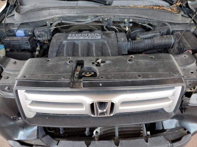 Photo 12 from auction – 2006 HONDA PILOT LX with VIN 2HKYF18196H532492