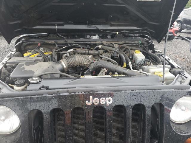 Photo 11 from auction – 2011 JEEP WRANGLER U with VIN 1J4BA3H1XBL504491