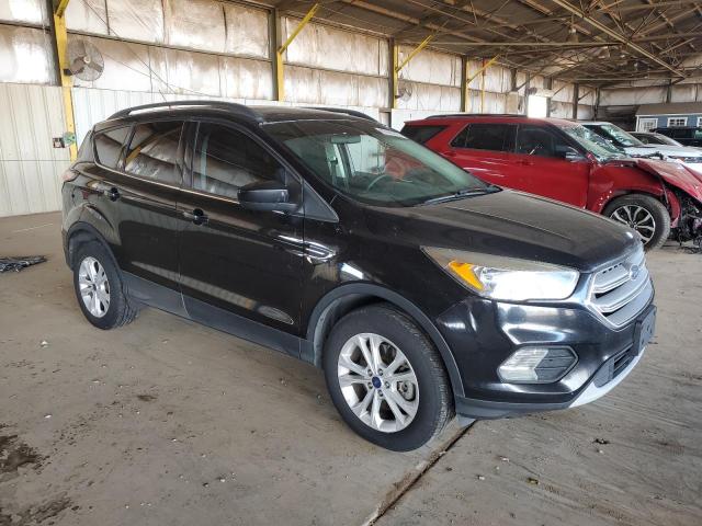 Photo 4 from auction – 2018 FORD ESCAPE SE with VIN 1FMCU9GD0JUA65824