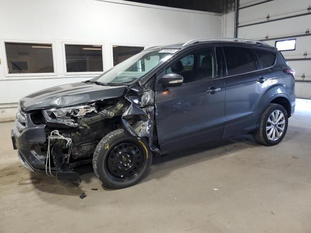 FORD ESCAPE TIT 2017 with VIN 1FMCU9J92HUB60786 - Photo from auction