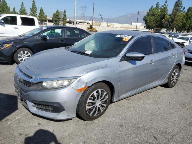 HONDA CIVIC LX 2018 with VIN 2HGFC2F53JH597224 - Photo from auction