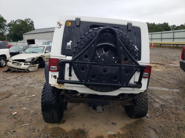 Photo 6 from auction – 2011 JEEP WRANGLER U with VIN 1J4BA3H18BL634608