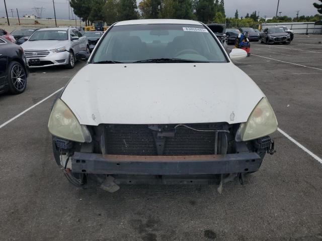 Photo 5 from auction – 2003 NISSAN ALTIMA BAS with VIN 1N4AL11D53C186467