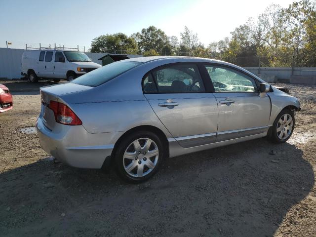 Photo 3 from auction – 2010 HONDA CIVIC LX with VIN 19XFA1F5XAE007868